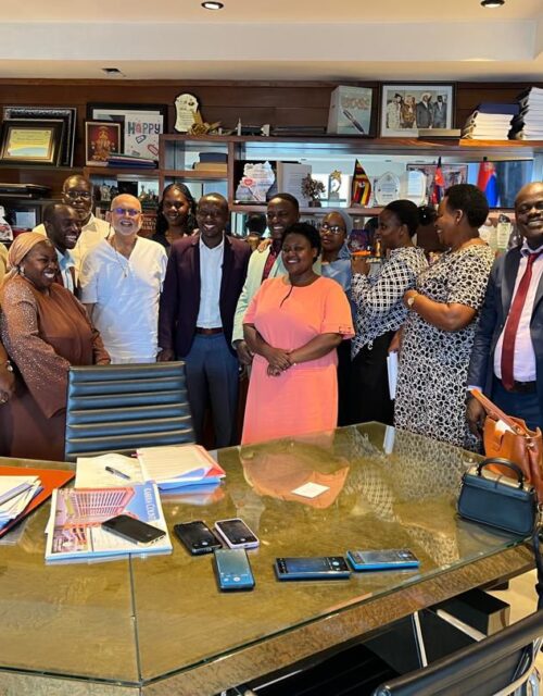 Smiling Kampala Parents School Teachers After Meeting With Solution-Oriented Dr Sudhir